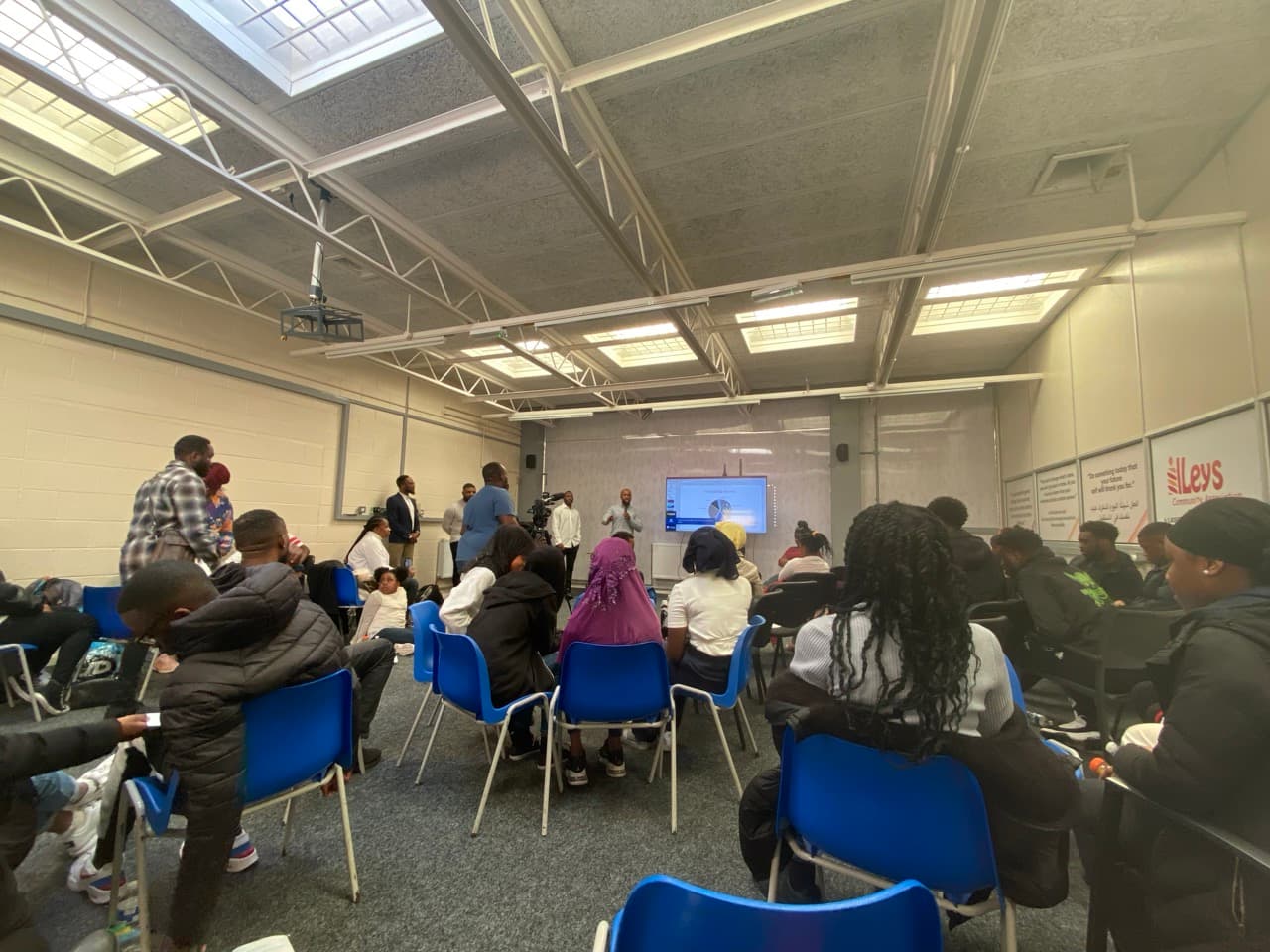 Founders of StudyStash presenting at African French Speaking Community Support Charity